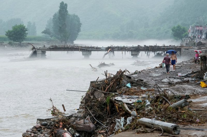 Beijing Floods Kill 34